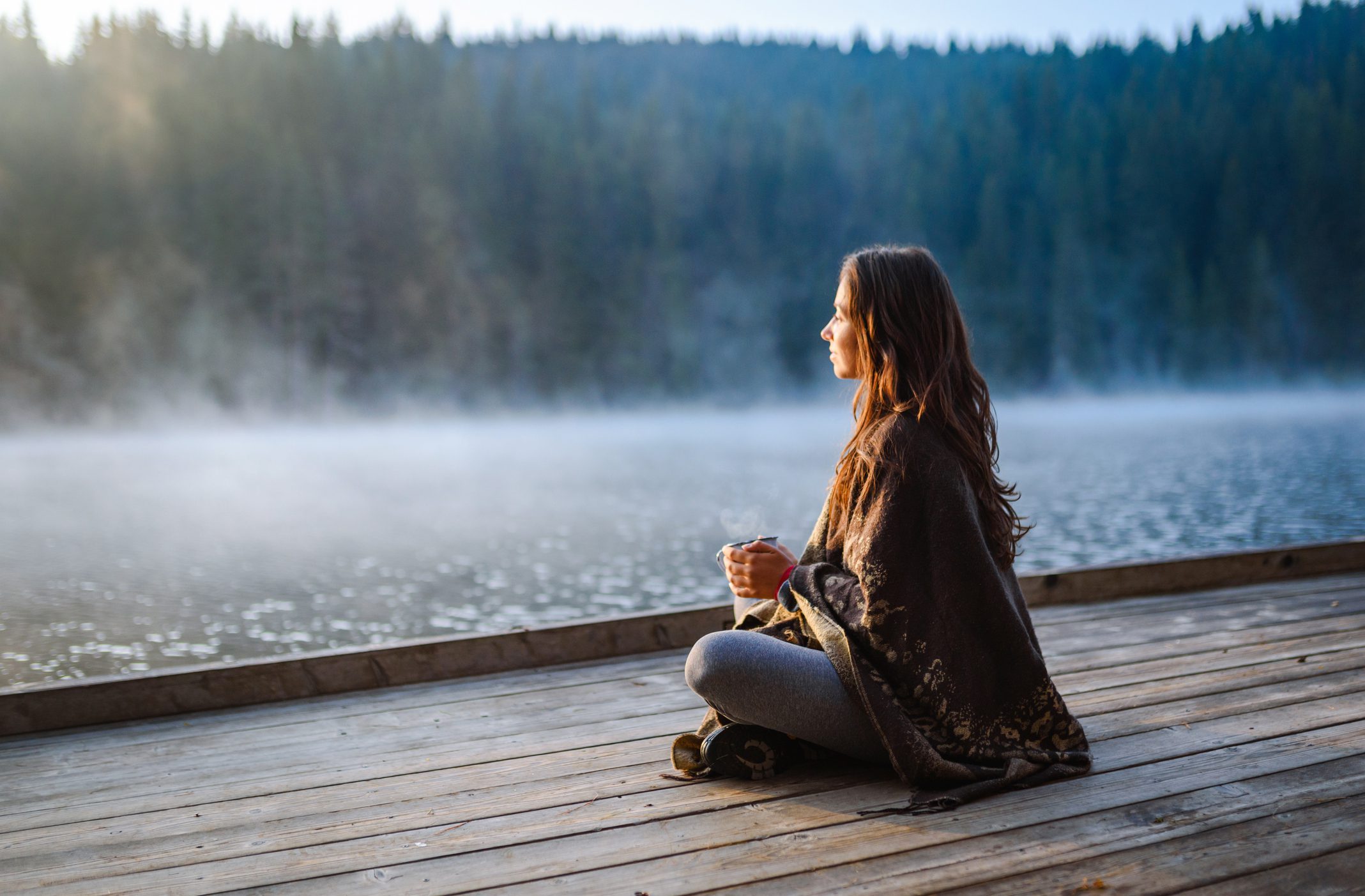 Woman relaxing in the nature stock photo
